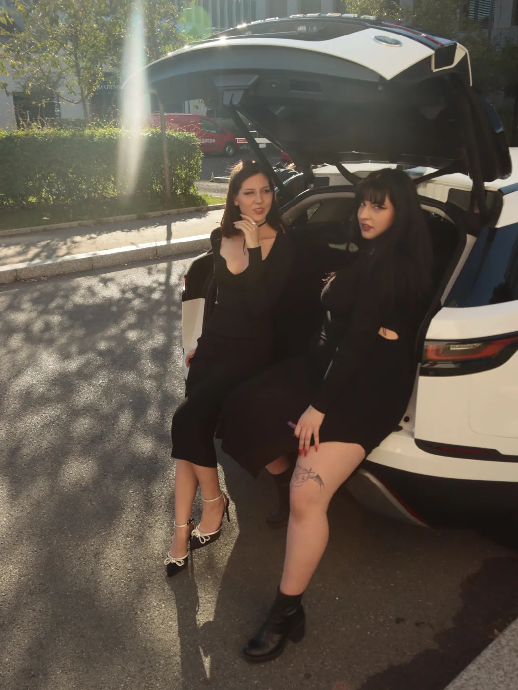 Duo in black · sunlit street shoot
