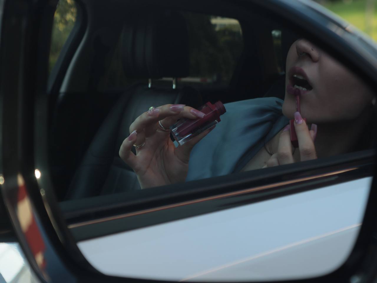 Mirror touch-up · lipstick moment