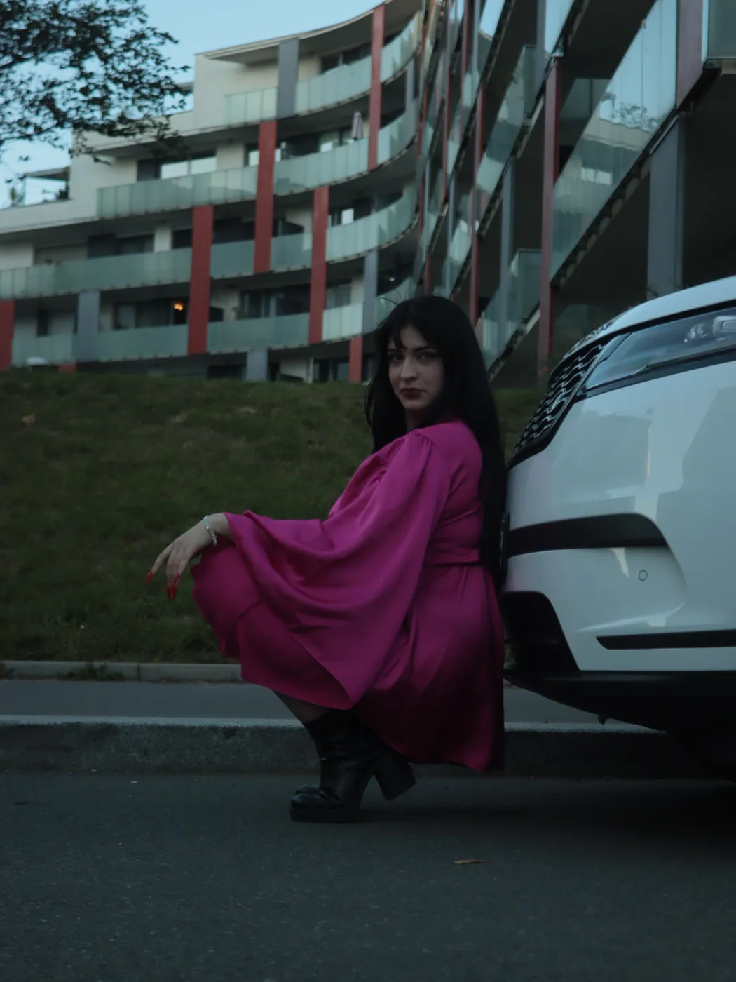 Pink silk · seated street portrait