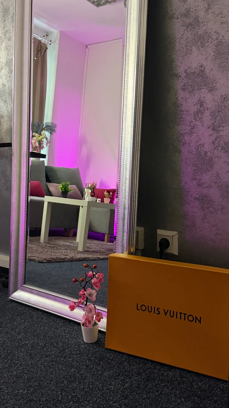 Full-length mirror · Louis Vuitton accent