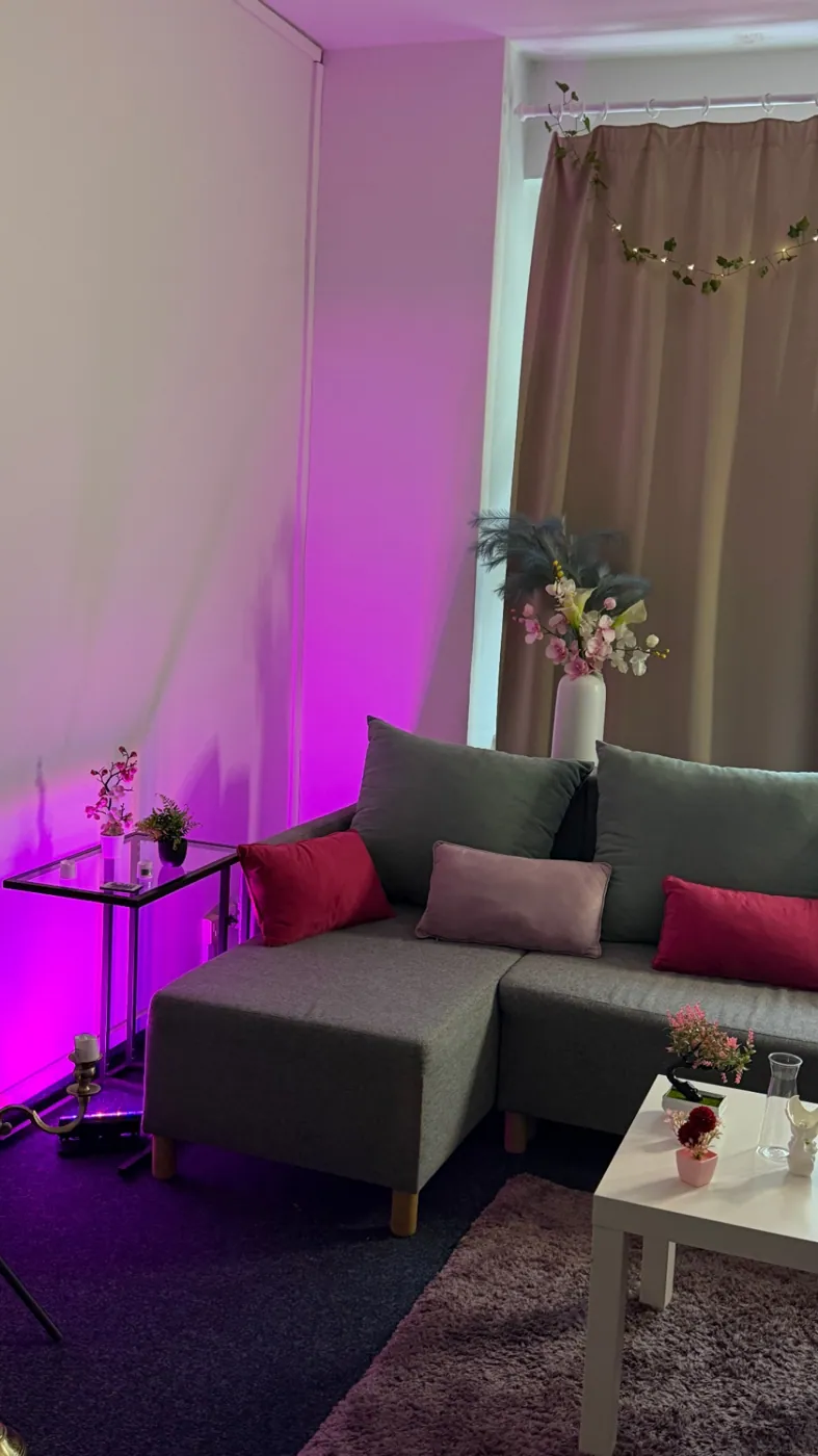 Lounge set · ambient pink lighting